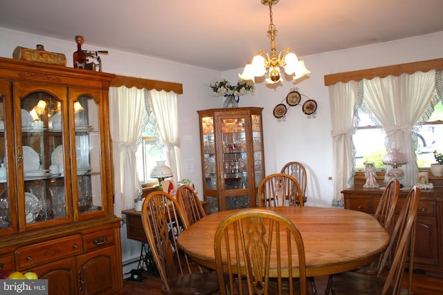 dining room with a notable chandelier