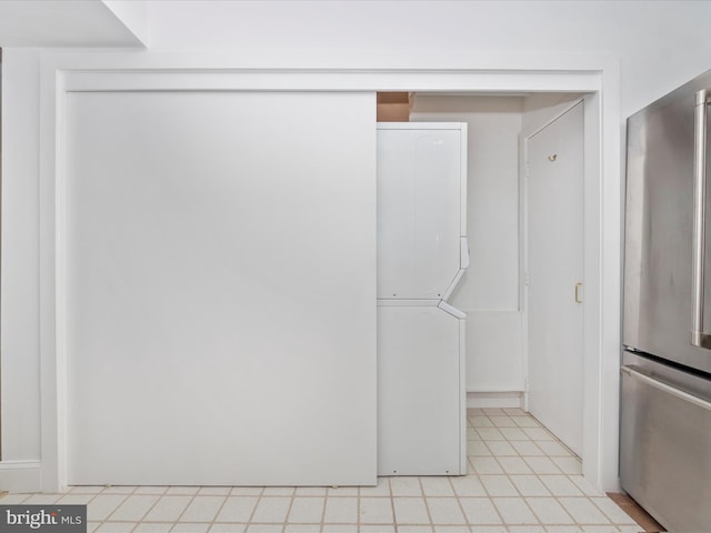 interior space featuring stacked washer and dryer