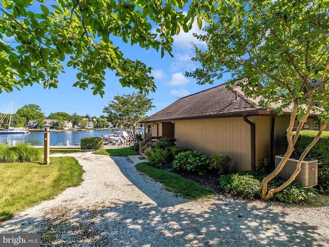 view of yard with a water view