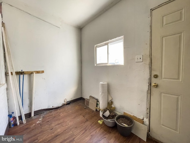 spare room with wood-type flooring