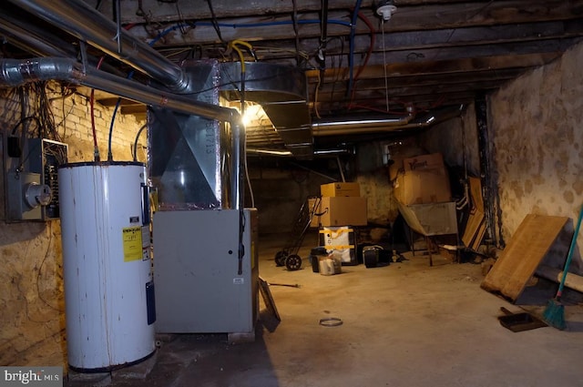 basement with heating unit and water heater