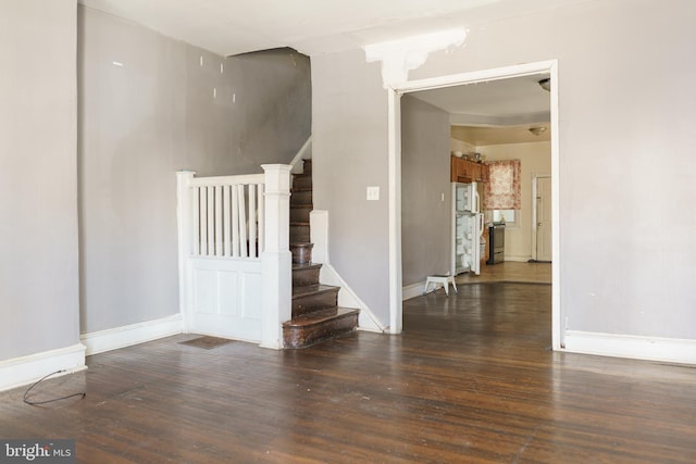 stairway featuring hardwood / wood-style flooring