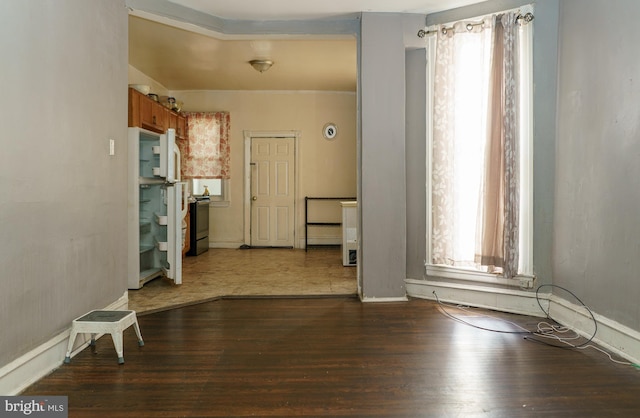 interior space with dark wood-type flooring