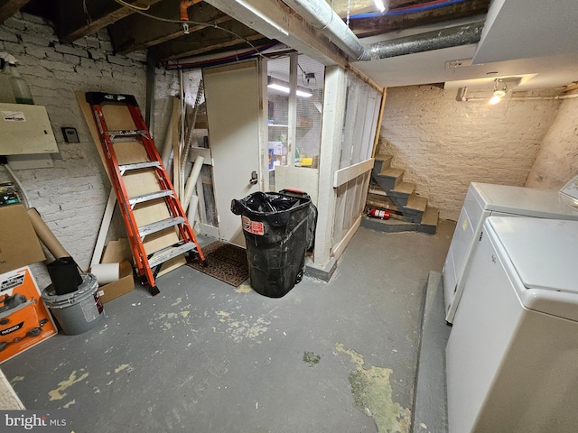 basement featuring separate washer and dryer