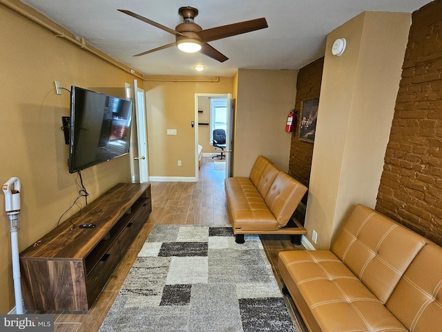 living room with ceiling fan