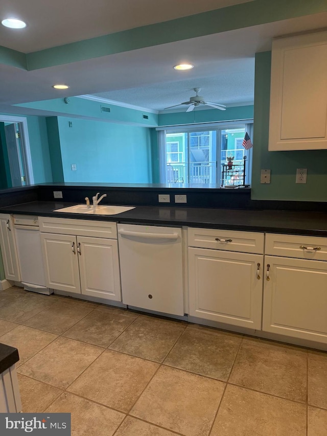 kitchen with ceiling fan, white dishwasher, white cabinets, and sink