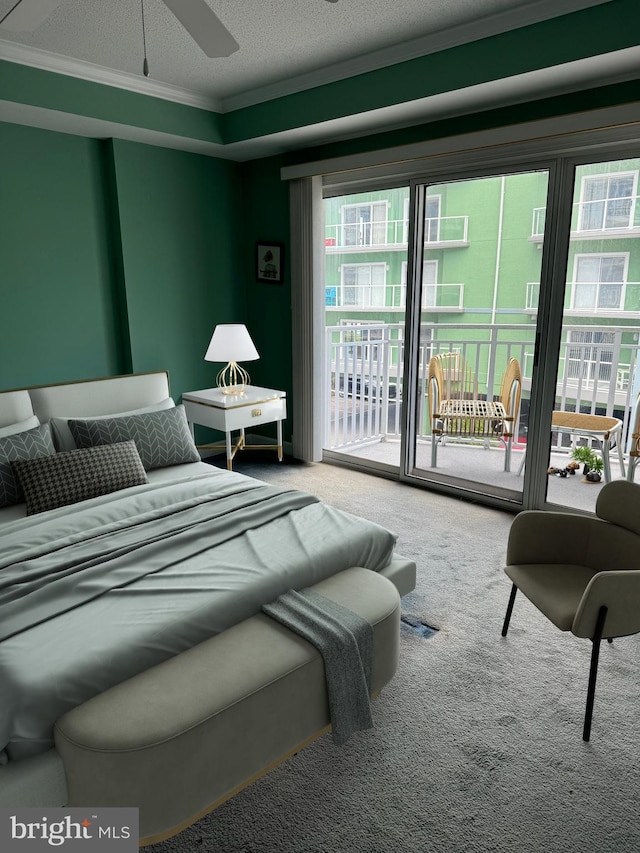 bedroom featuring ceiling fan, carpet floors, access to exterior, a textured ceiling, and ornamental molding