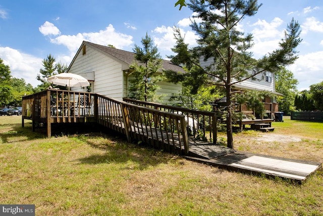 exterior space featuring a yard and a deck