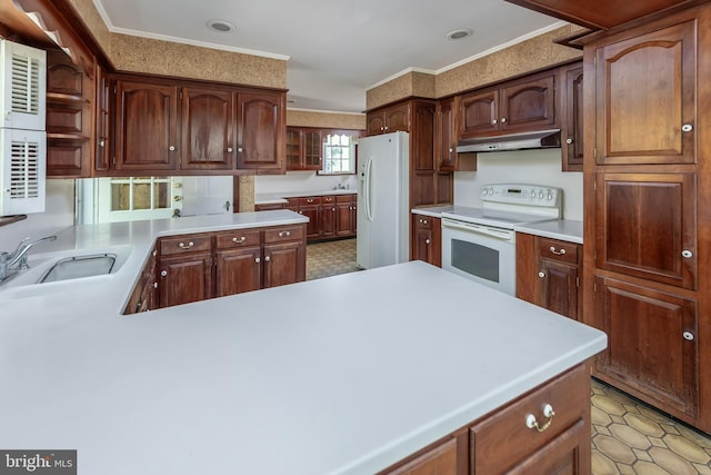 kitchen featuring kitchen peninsula, white appliances, crown molding, and sink