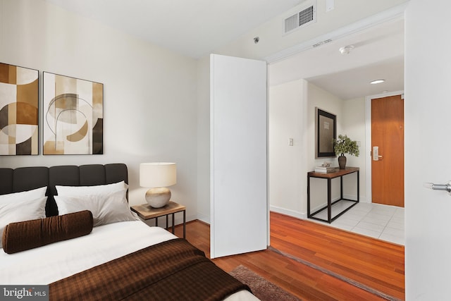 bedroom featuring light wood-type flooring