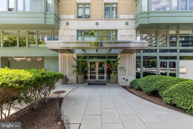 entrance to property featuring french doors