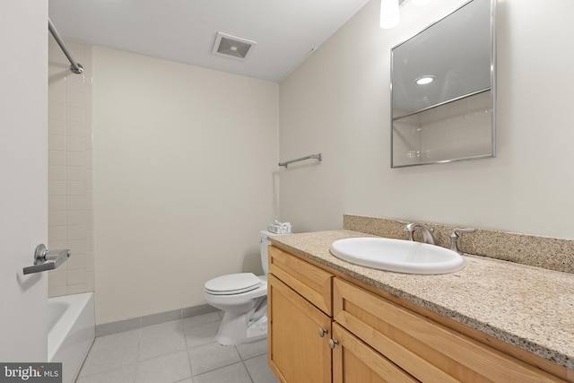 full bathroom featuring tile patterned flooring, vanity, toilet, and shower / tub combination