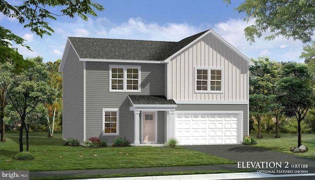 view of front of home with a front yard and a garage