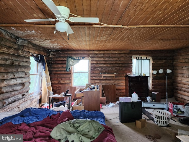 carpeted bedroom featuring rustic walls, ceiling fan, and wooden ceiling