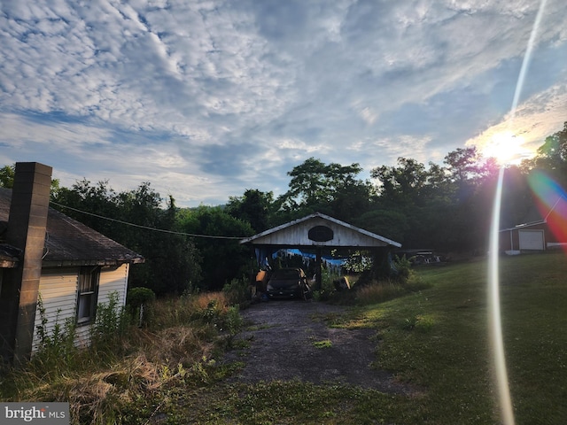 view of yard with a carport