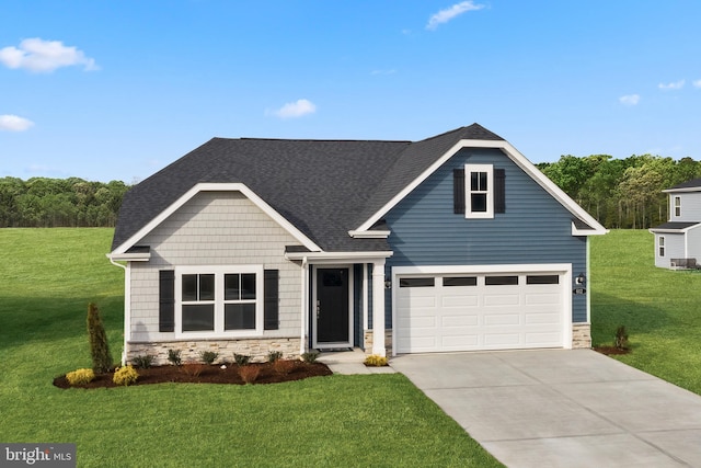 view of front of property featuring a garage and a front yard