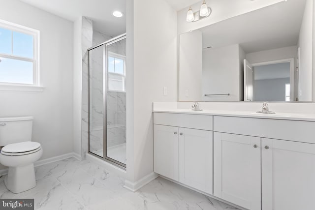 bathroom featuring toilet, walk in shower, tile patterned flooring, and double sink vanity