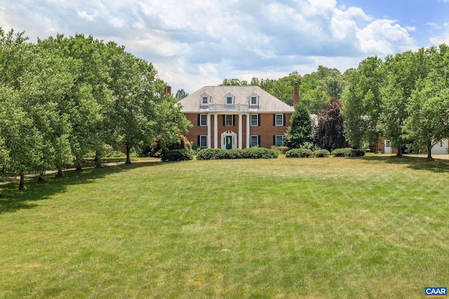 14186 Devils Three Jump Rd, Milford, VA 22514 - colonial home featuring a balcony and a front yard