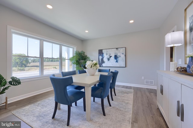 dining room featuring hardwood / wood-style flooring