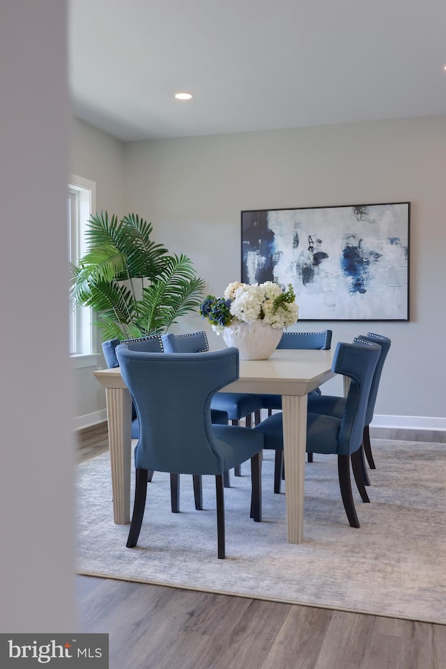 dining space featuring light hardwood / wood-style flooring