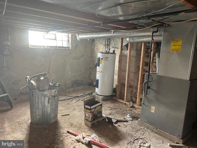 basement with heating unit and water heater