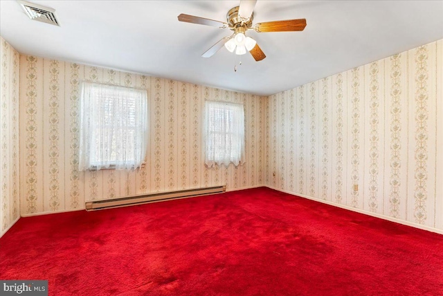 unfurnished room with baseboard heating, carpet, and ceiling fan