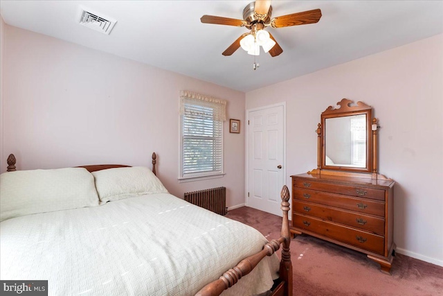 bedroom featuring carpet flooring, ceiling fan, and radiator