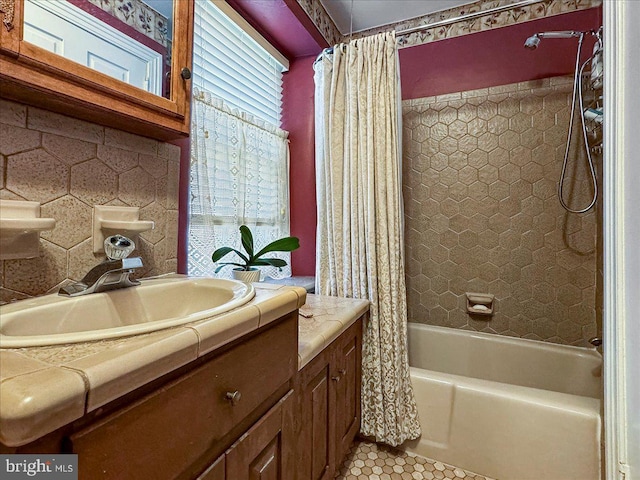 bathroom with decorative backsplash, vanity, tile patterned floors, and shower / bathtub combination with curtain