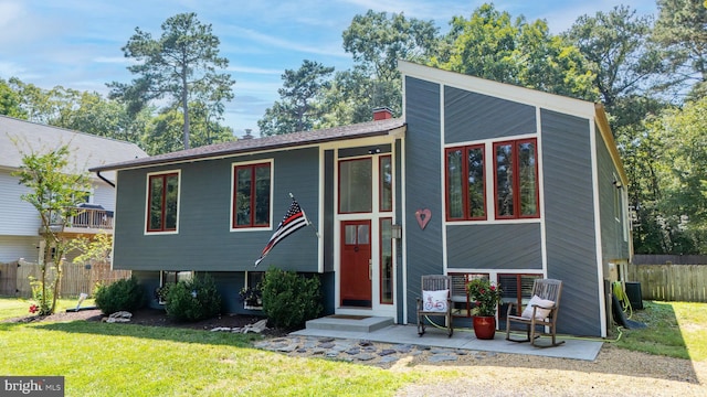 view of front of property with a front lawn