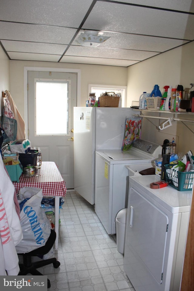 laundry room with independent washer and dryer