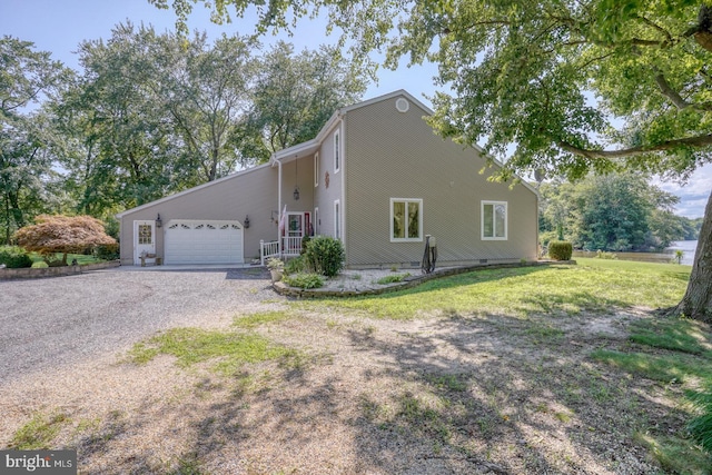 view of side of property featuring a garage