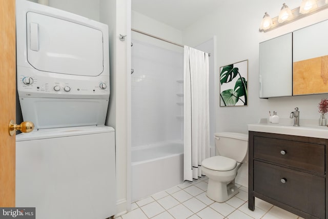 full bathroom featuring tile patterned floors, shower / bath combination with curtain, stacked washer / drying machine, toilet, and vanity