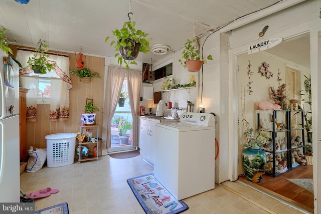 laundry room with washer / dryer