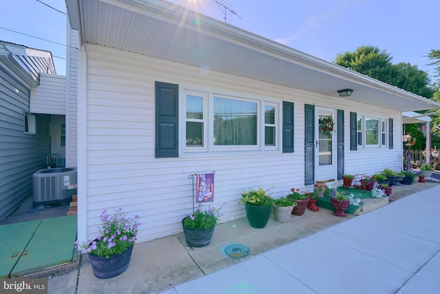 view of front of home with central air condition unit