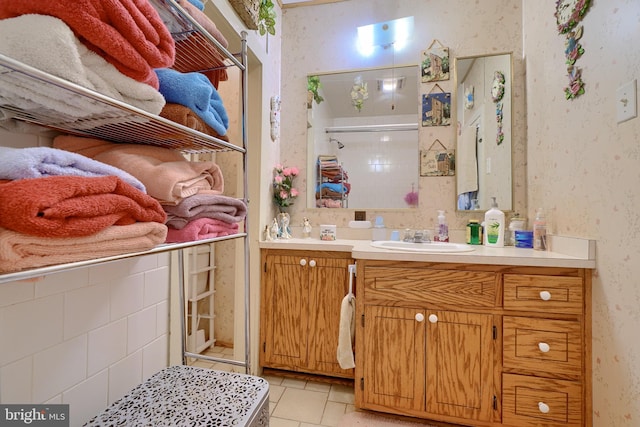 bathroom featuring tile patterned floors and vanity