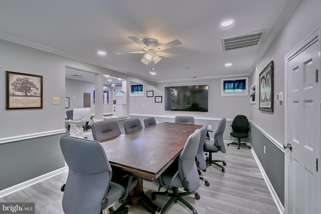 office space with ceiling fan, light hardwood / wood-style floors, and crown molding