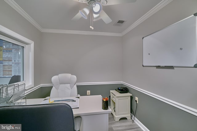 office with ceiling fan, light hardwood / wood-style flooring, and ornamental molding