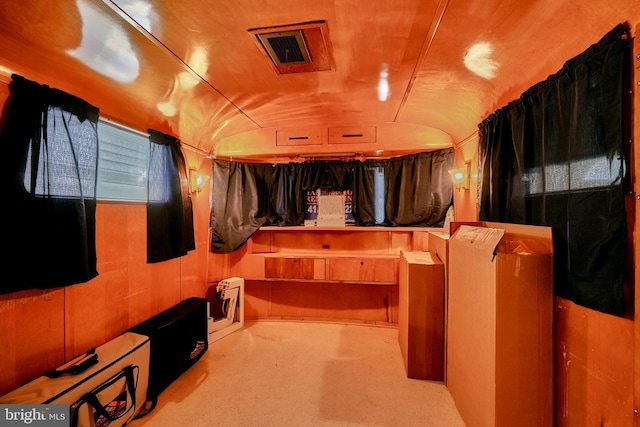 home theater featuring vaulted ceiling