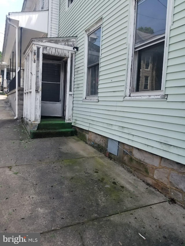 view of home's exterior with a patio area