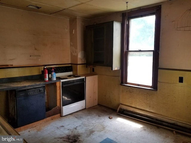 kitchen with black dishwasher, pendant lighting, and white electric range oven