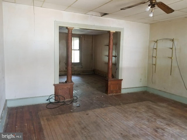 spare room featuring ceiling fan and hardwood / wood-style flooring