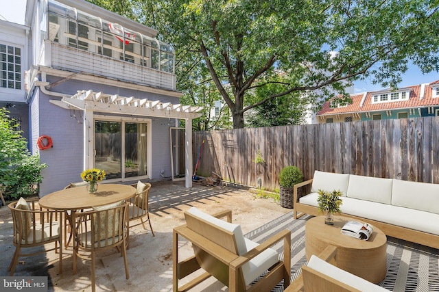 view of patio / terrace featuring an outdoor hangout area and a balcony