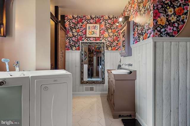 bathroom featuring sink and tile patterned flooring