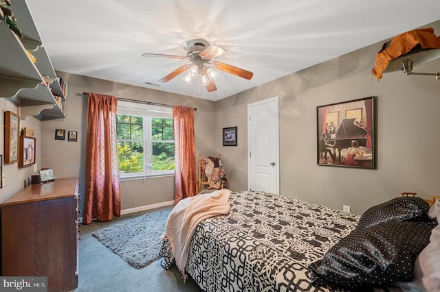 bedroom with ceiling fan and carpet