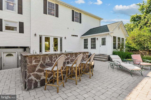 view of patio / terrace with a wet bar