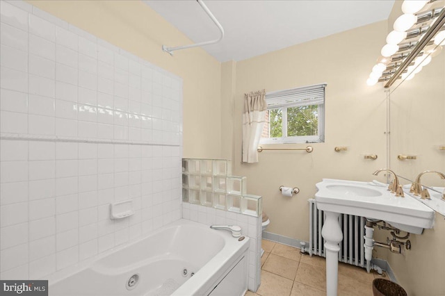 bathroom with tile patterned floors and toilet