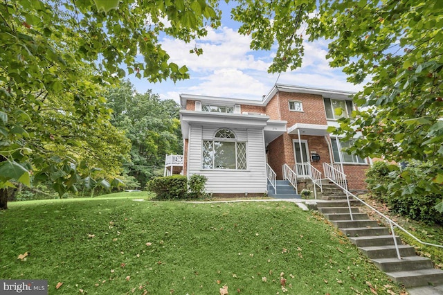 view of front of property with a front lawn