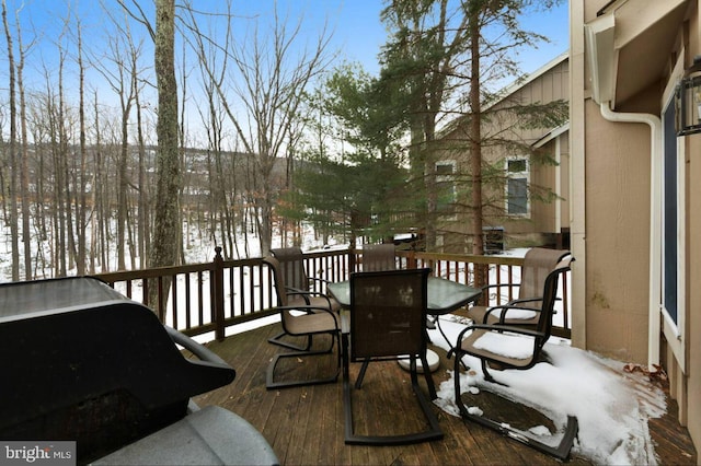 view of snow covered deck