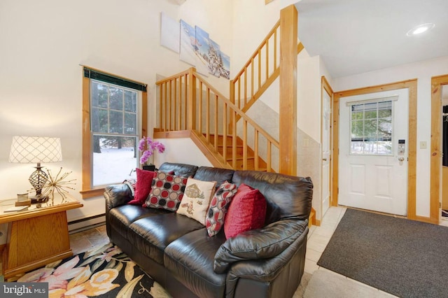 living room featuring a baseboard heating unit