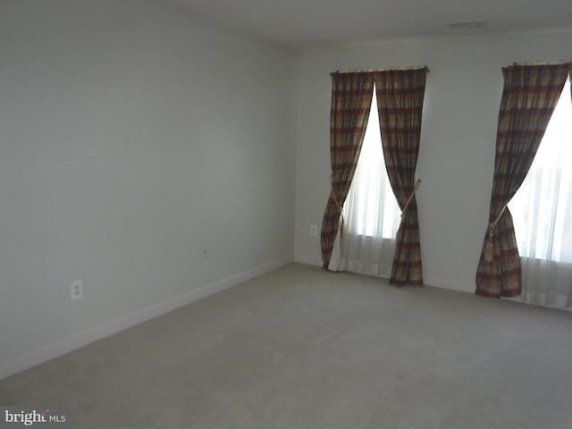 view of carpeted spare room